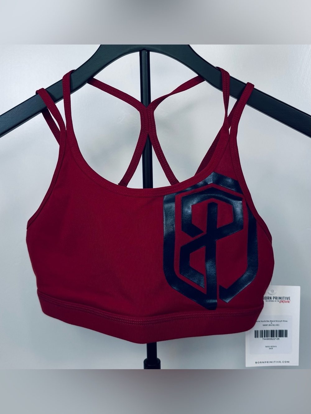 NWT Born Primitive Woman’s Warrior Sports Bra in BP color (brand strength wine)